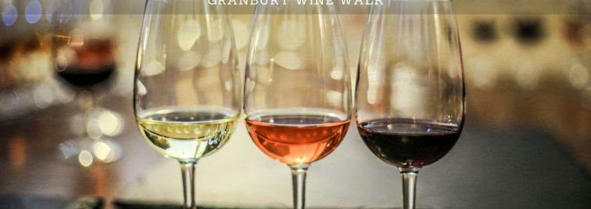 Three wine glasses with white, rose, and red wine. Sip. Savor. Shop.