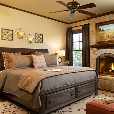 Jesse James Room bed and fireplace
