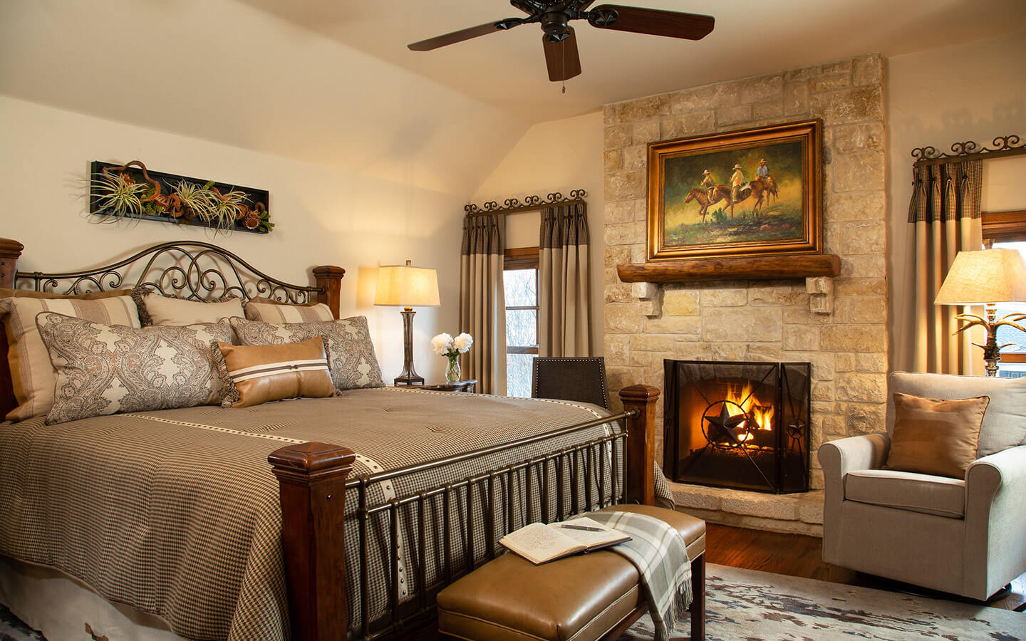 Texas Star Room bed and fireplace