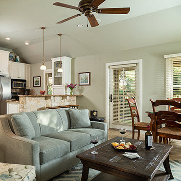 The Cottage living room, dining room, and kitchen