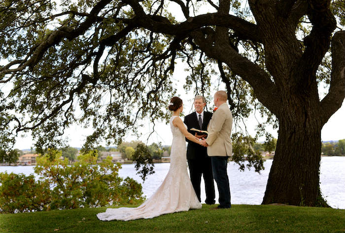 Elopement under tree in front of lake granbury