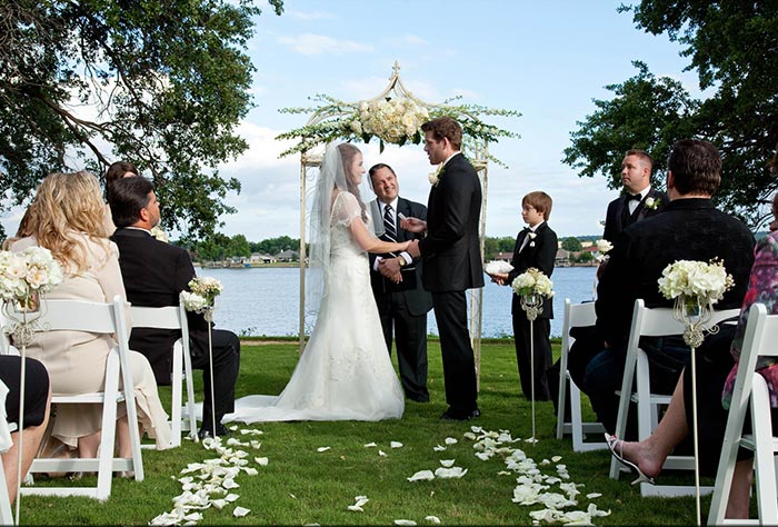 Wedding ceremony facing lake