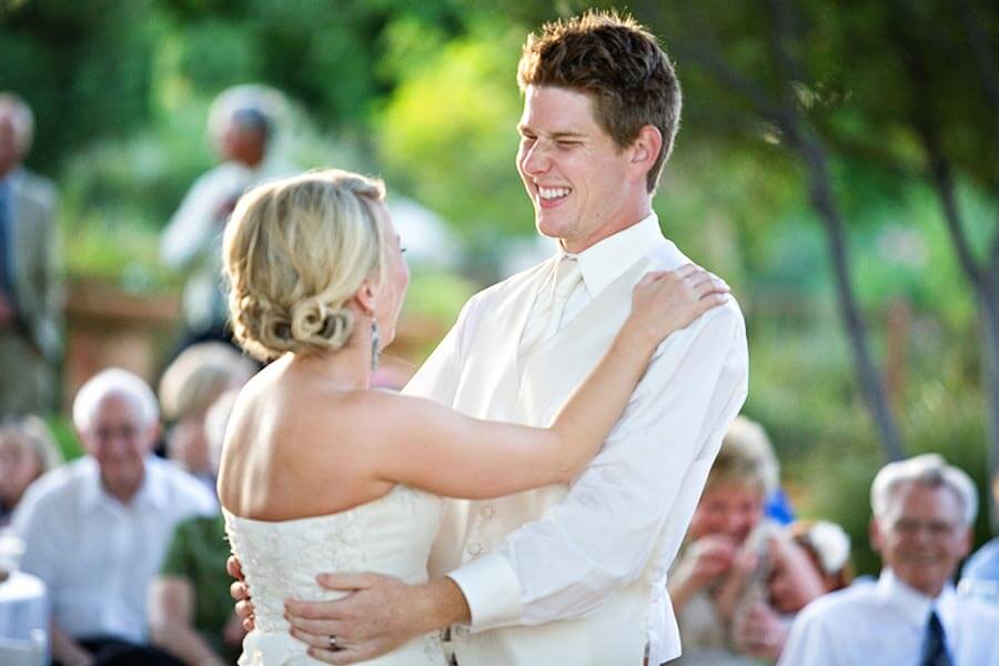 newlyweds dance together at texas wedding reception