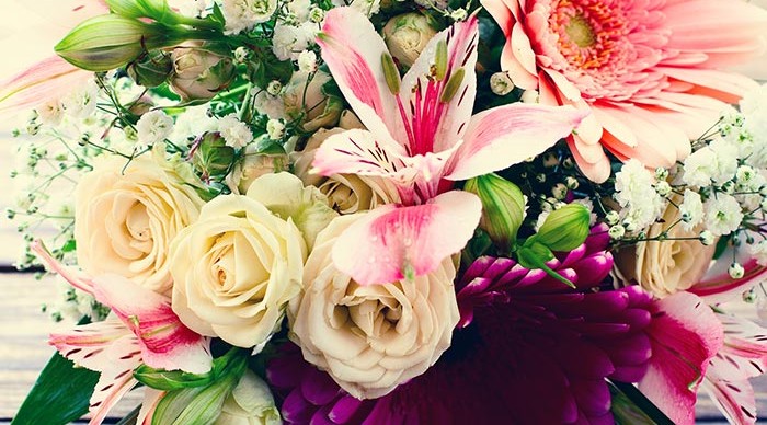 Pink, green, white and purple bouquet of flowers