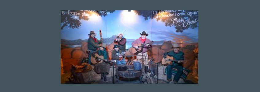 Country band in front of backdrop